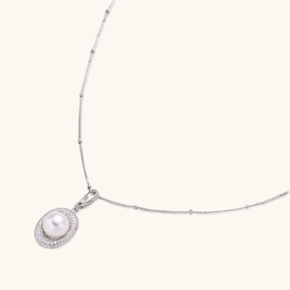 Sterling silver necklace with freshwater pearl in sparkling crystal halo pendant on delicate beaded chain