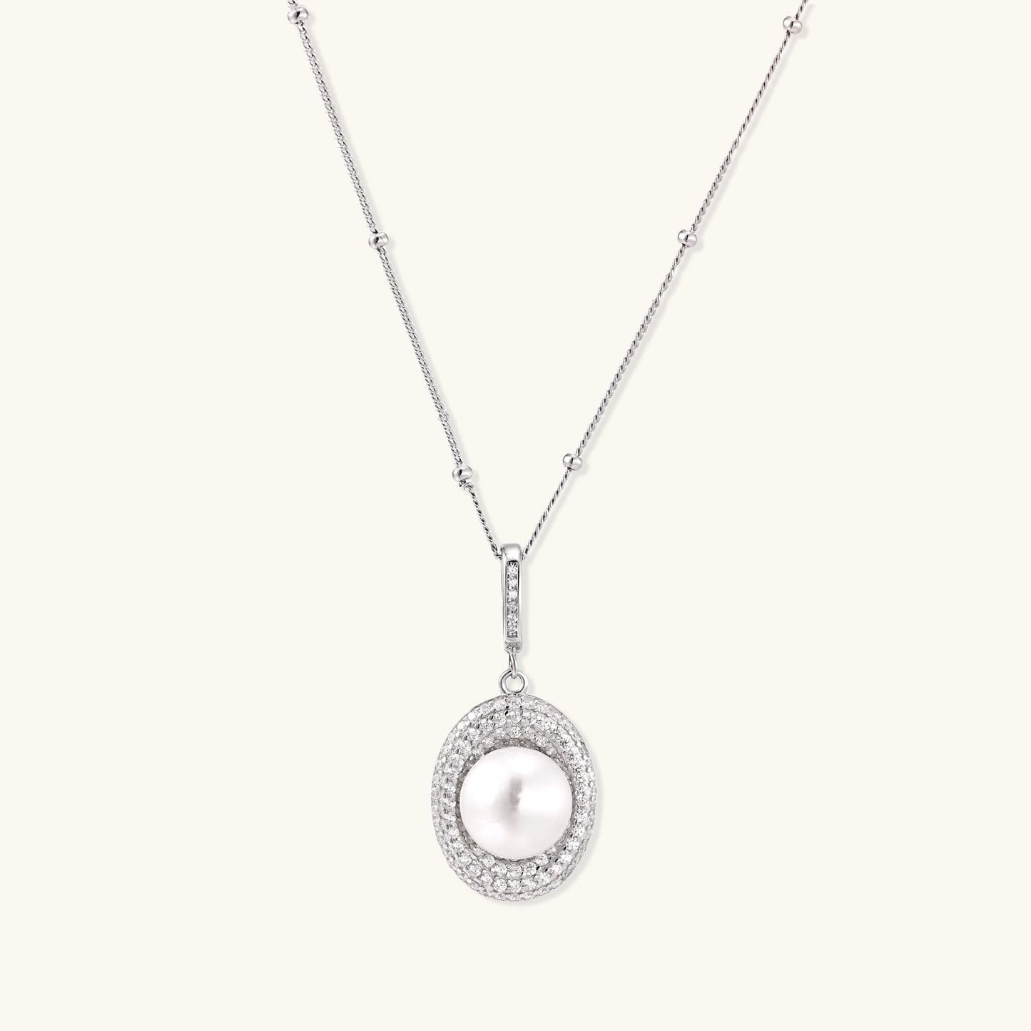 Sterling silver necklace with freshwater pearl in sparkling crystal halo pendant on delicate beaded chain